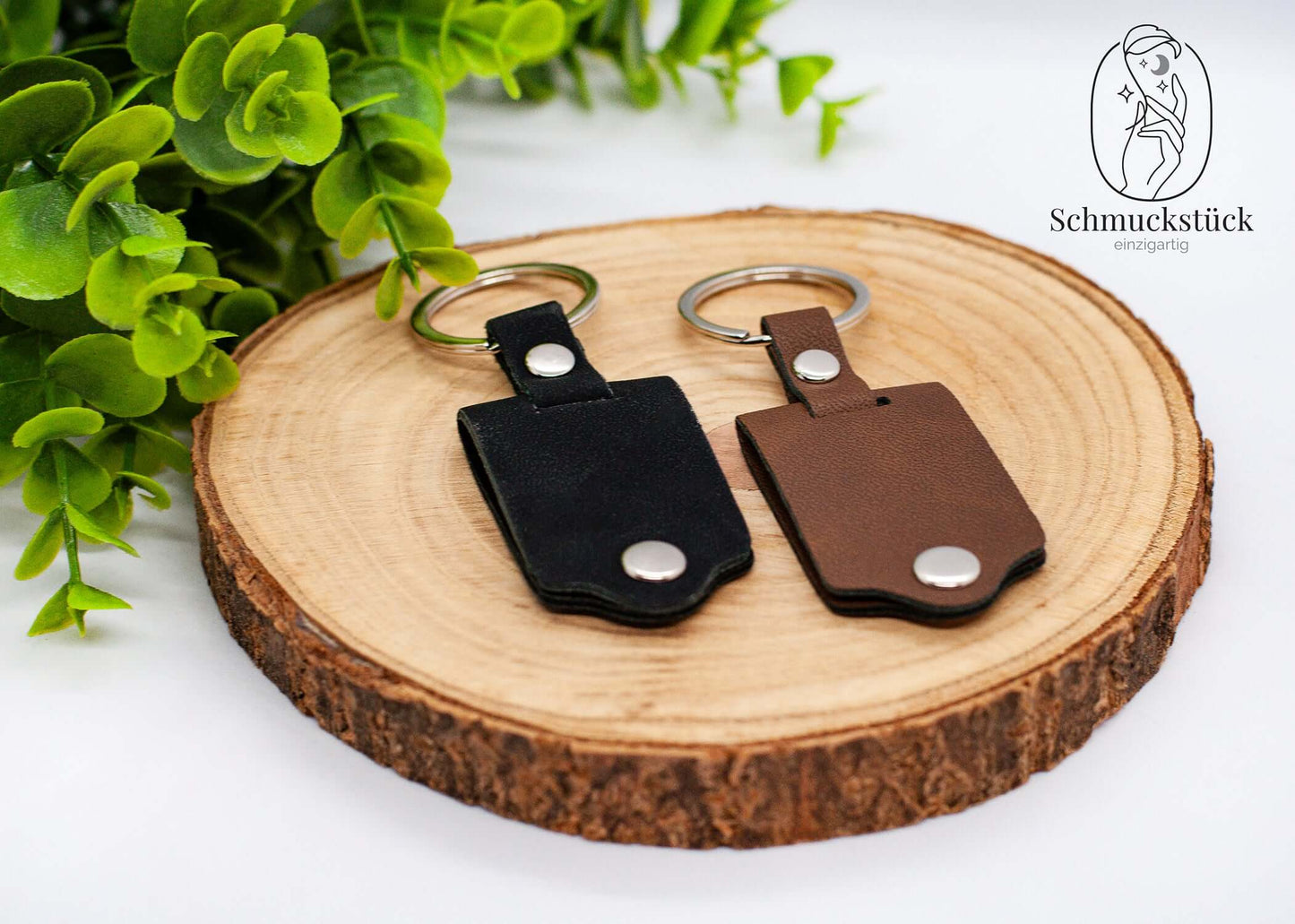 Ein personalisierter Klapp-Schlüsselanhänger aus Kunstleder für eigenes Foto.