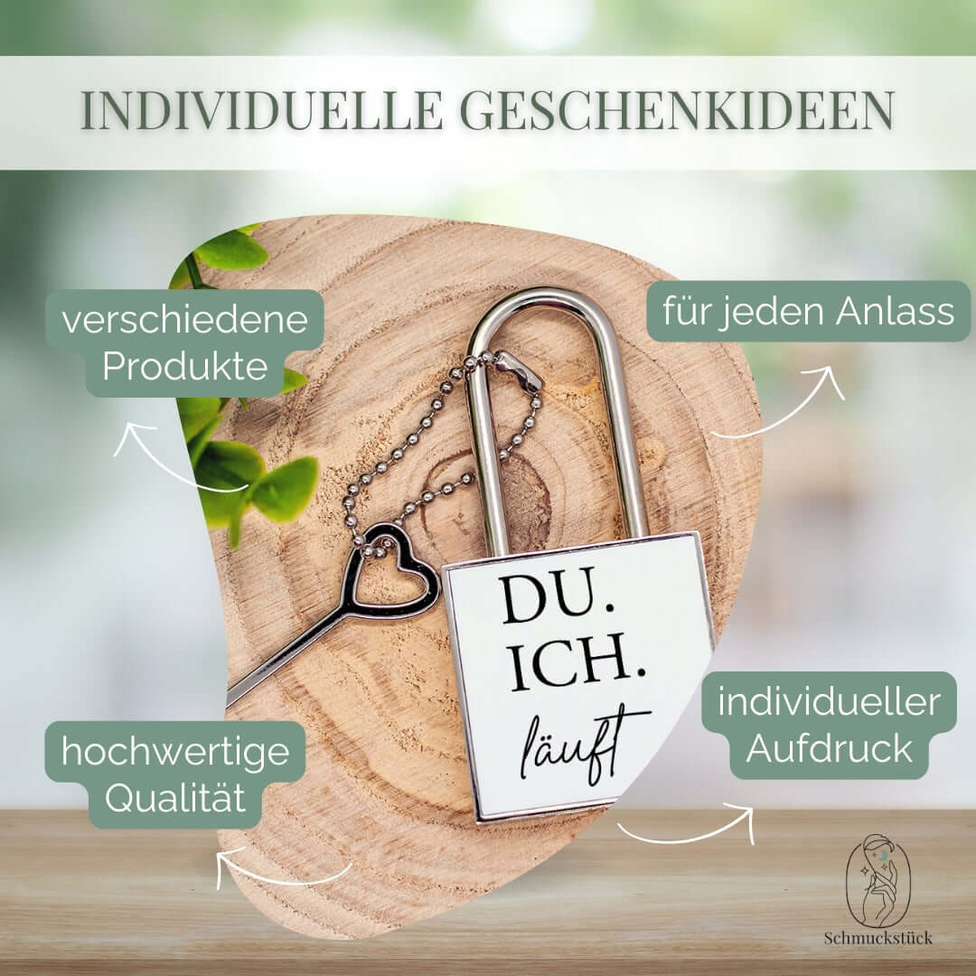 Ein Liebesschloss mit individuellen Aufdruck: "Du. Ich. Läuft." mit Schlüssel.